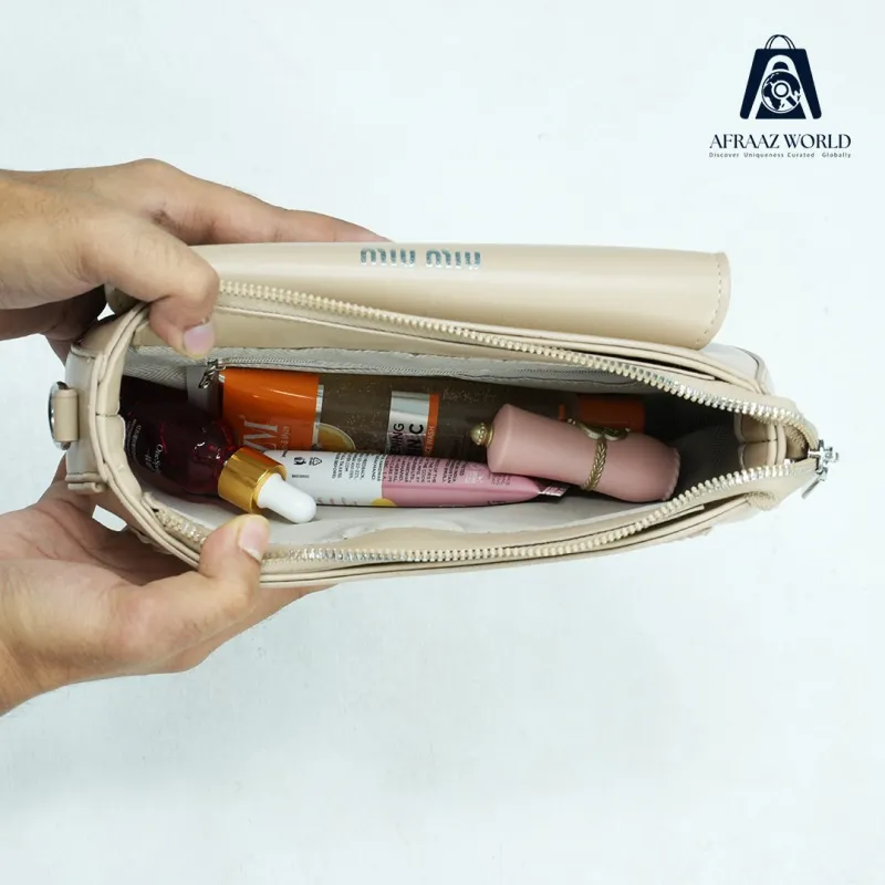 Elegant MIU MIU  Pink Textured Crossbody Bag with Triangle Logo
